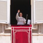Pope Leo XIV delivers his blessing as he recites the Regina Coeli noon prayer from the window of his studio overlooking St. Peter's Square, at the Vatican, Sunday, May 17, 2026. (AP Photo/Andrew Medichini)