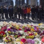 Flowers line a memorial at Mel Lastman Square in Toronto on Thursday, April 26, 2018 for the victims of a deadly van attack. THE CANADIAN PRESS/Cole Burston