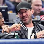 FILE - Former NFL quarterback Tony Romo, right, attends an NBA basketball game between the Indiana Pacers and the Dallas Mavericks on March 5, 2024, in Dallas. (AP Photo/Tony Gutierrez, File)