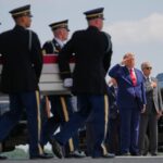 President Donald Trump and Secretary of Defense Pete Hegseth, salute as a U.S. Army carry team moves a transfer case containing the remains of Pvt. Isabella Gonzales of Carrollton, Texas, Wednesday, July 22, 2026, at Dover Air Force Base, Del. (AP Photo/Matt Rourke)