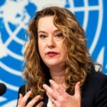 U.S. Amy Pope, Director General of the International Organization for Migration (IOM), briefs the media on Protecting Victims of Trafficking in Online Scam Operations, during a press briefing, at the European headquarters of the United Nations in Geneva, Switzerland, Tuesday, July 28, 2026. (Salvatore Di Nolfi/Keystone via AP)