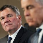 Canada-U.S. Trade Minister Dominic LeBlanc, left, listens as Prime Minister Mark Carney meets with Canada's premiers in Charlottetown on Thursday, July 23, 2026. THE CANADIAN PRESS/Darren Calabrese