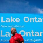 Ontario Premier Doug Ford unveils a sign for Lake Ontario at Fifty Point Conservation Area in Grimsby, Ont., on Saturday, Aug. 29, 2026. THE CANADIAN PRESS/Keito Newman