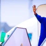 President-Bola-Tinubu-waving-on-an-airplane