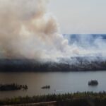 A wildfire burns in northern Manitoba near Flin Flon on Tuesday, May 14, 2024. THE CANADIAN PRESS/David Lipnowski